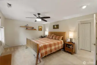The room's generous size would allow for a full suite of bedroom furnishings.