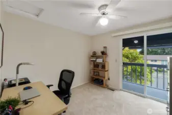 Thos 2nd bdrm. offers both comfort and functionality w/a deep closet for ample storage & a sliding door that opens directly to the front porch, creating a private spot to enjoy the outdoors right from your room!