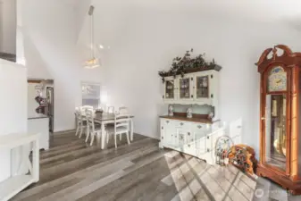 the front room extends into a spacious dining area