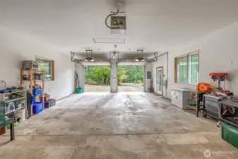 An EV charger pictured on the right by the entry door.