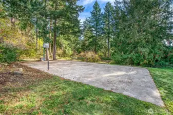 Get your game on! The property features a private outdoor court perfect for basketball, pickleball, or impromptu games with friends.