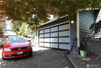 New glass garage door...you can see out, nobody can see in!