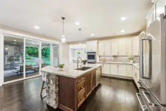 Chef's kitchen! 3 sets of sliders to your covered patio