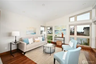 Expansive wall of windows with protected views. Vaulted ceilings make the space feel like you're on the top of the world.