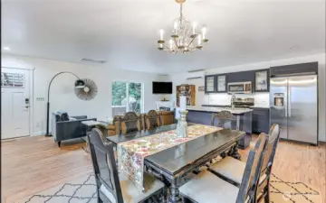 **Chandelier pictured has been removed and replaced with a new light fixture, does not convey with property** DADU features an open layout offering flexible space and effortless flow among living spaces.