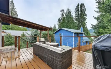 Spacious deck off the DADU apartment with views of the lake! Perfect for lounging, grilling and soaking in the views during all seasons on Alder Lake.