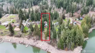 Aerial with ESTIMATED lot lines outlined. Lakefront is deeded to TPU but currently maintained by property owner.