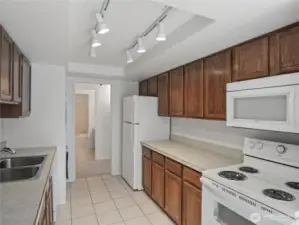 This kitchen is functional, with ample storage and counter space. Move in and plan your dream kitchen. Check out some of the sold units in this building for creative design ideas.