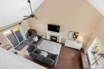 Looking down from the upstairs landing you can see how light this room is.