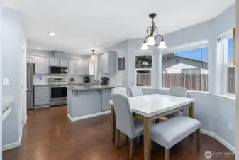 The kitchen looks very updated with the painted cabinetry and very nice updated appliances.  The granite counters add so much character.