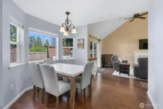 View from kitchen into the dining area and adjoining great room.  Very light and bright.