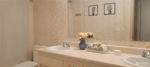 Full Guest Bathroom Features Dual Vanity Sink