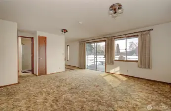 upstairs living room walking out to deck