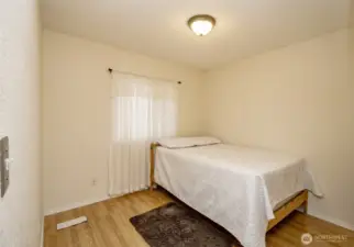 Bedroom number one is bright and spacious!