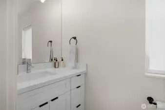 Spacious half bathroom on the main level