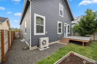 There is a gate along side the home to the south side and a nice walkway.