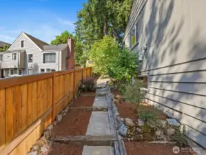 Side yard garden space that leads to front yard.