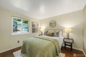 The first of two generous bedrooms on this level for a total of three.