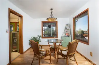 The kitchen, to the left, has pocket doors- how do you entertain?  Making magic with your team of elves sequestered in the kitchen?  Close the doors.  Love to be in the midst of it all?  Keep the door open and let the energy flow.