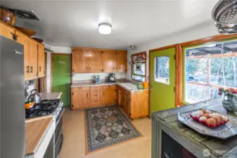 The kitchen is large- plenty of room for the chefs in your home and with all that cupboard space and the walk in pantry, trips to the store can be made less often, since you have plenty of room to store your stocked items.