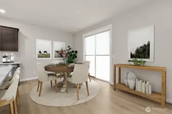 Open dining area off the kitchen.  Photo is representational. Actual home is under construction and materials, colors, and finishes will vary. See site agent for details.
