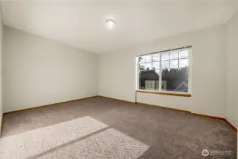 Another view of the primary bedroom