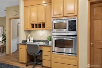 Kitchen with a built-in desk, ideal for work, study, or household organization