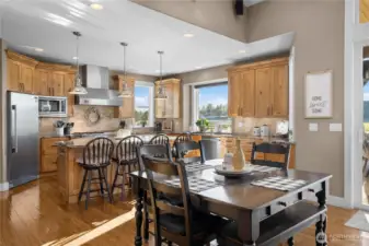 Large dining area between kitchen and great room.