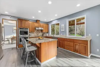 Large Kitchen, pull out shelves, double ovens, gas cooking & Walk in Pantry