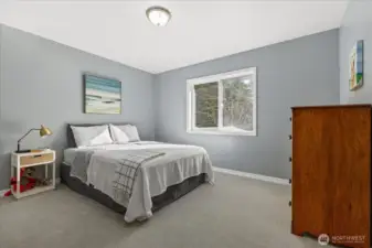 secondary bedroom with walk in closet