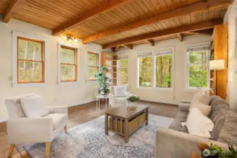 Thoughtfully designed with wood car decking ceilings and exposed beams.