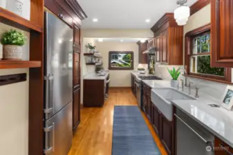 Kitchen was completely redone by the new owner. This six-figure plus remodel includes all new appliances, quartz countertops, new cabinetry, and a washer/dryer unit.