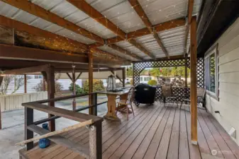 Large covered deck provides a sweet spot to relax outside year round.