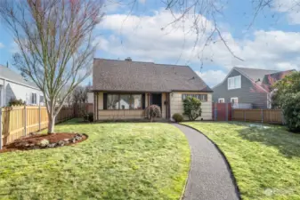 Such a sweet home and lot with mature trees.