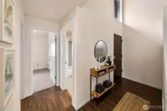 Entry, two bedrooms one bath and the laundry room are on this main level. It's nice to have an entry to kick off shoes and receive guests.