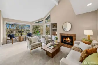 Cozy fireplace anchors the living and feels like a lodge or chalet.