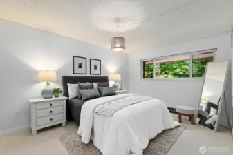 Welcome to the huge primary bedroom. King bed fits easily, with room to spare