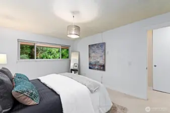 The greenery through the window feels like you're in the forest