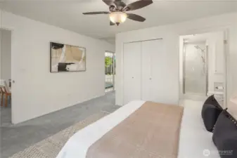 Secondary suite on main level with lounge seating and spa access