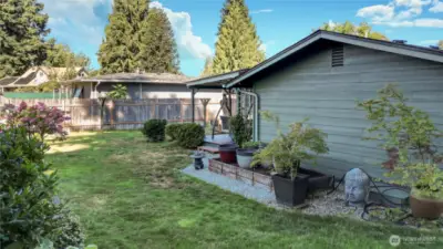 View of your backyard, covered deck is straight ahead, fully fenced and nice in size.
