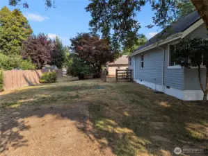 Plenty of yard for space for a garden or what your dreams can come up with!