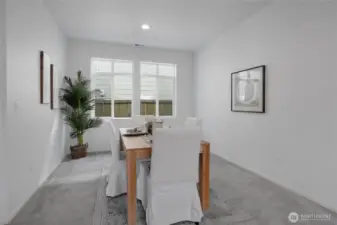 The formal Dining Room also has large windows.