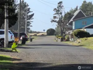 Street scene, dead ends at private neighborhood Dunes Trail to the Ocean Beach.