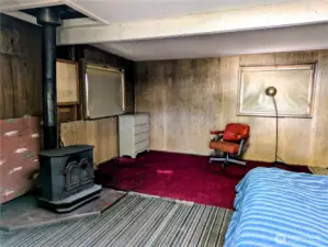 Enter into the cabin, wood heat.