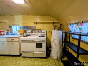 antique stove incl, burners work not sure of oven.