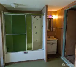 Open concept bathroom in main bedroom