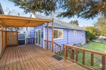 A full-sized porch is found on the back of the massive 3082 sqft lot