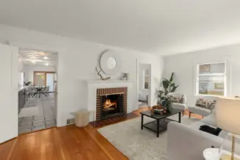 Inside a classic brick fireplace warms up the main living area