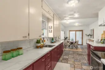 While thick white quartz countertops maintain an elevated timeless aesthetic