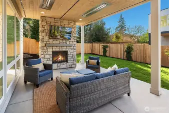 Private outdoor covered living area with fireplance & BBQ hook-up